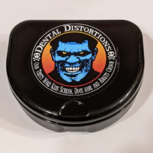 Black case to store Dental Distortion FX Fangs